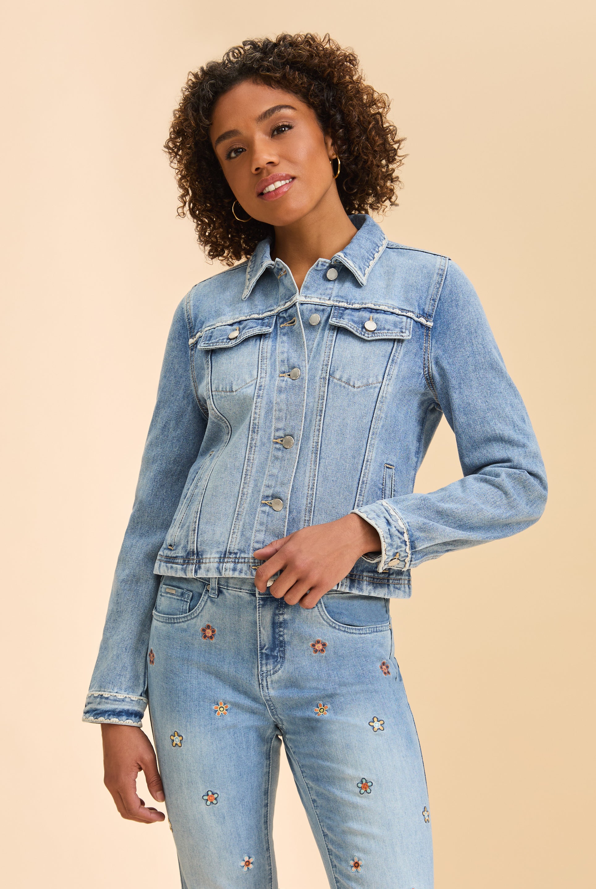 Front view of pale wash denim jacket with button-up design and flap chest pockets by French Dressing Jeans (FDJ)