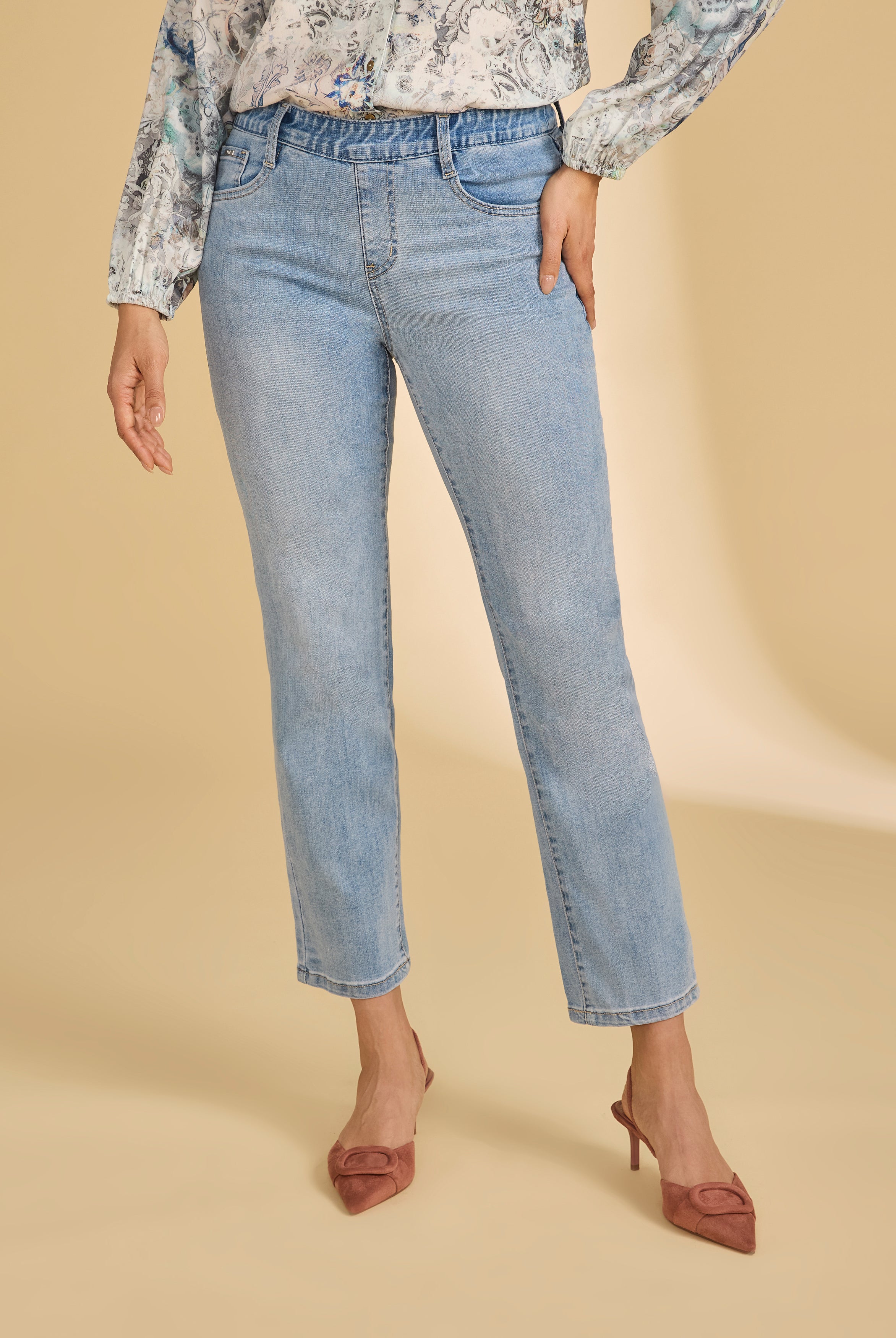 Front view of light medium pull-on ankle jeans with a classic fit and printed blouse by French Dressing Jeans (FDJ)