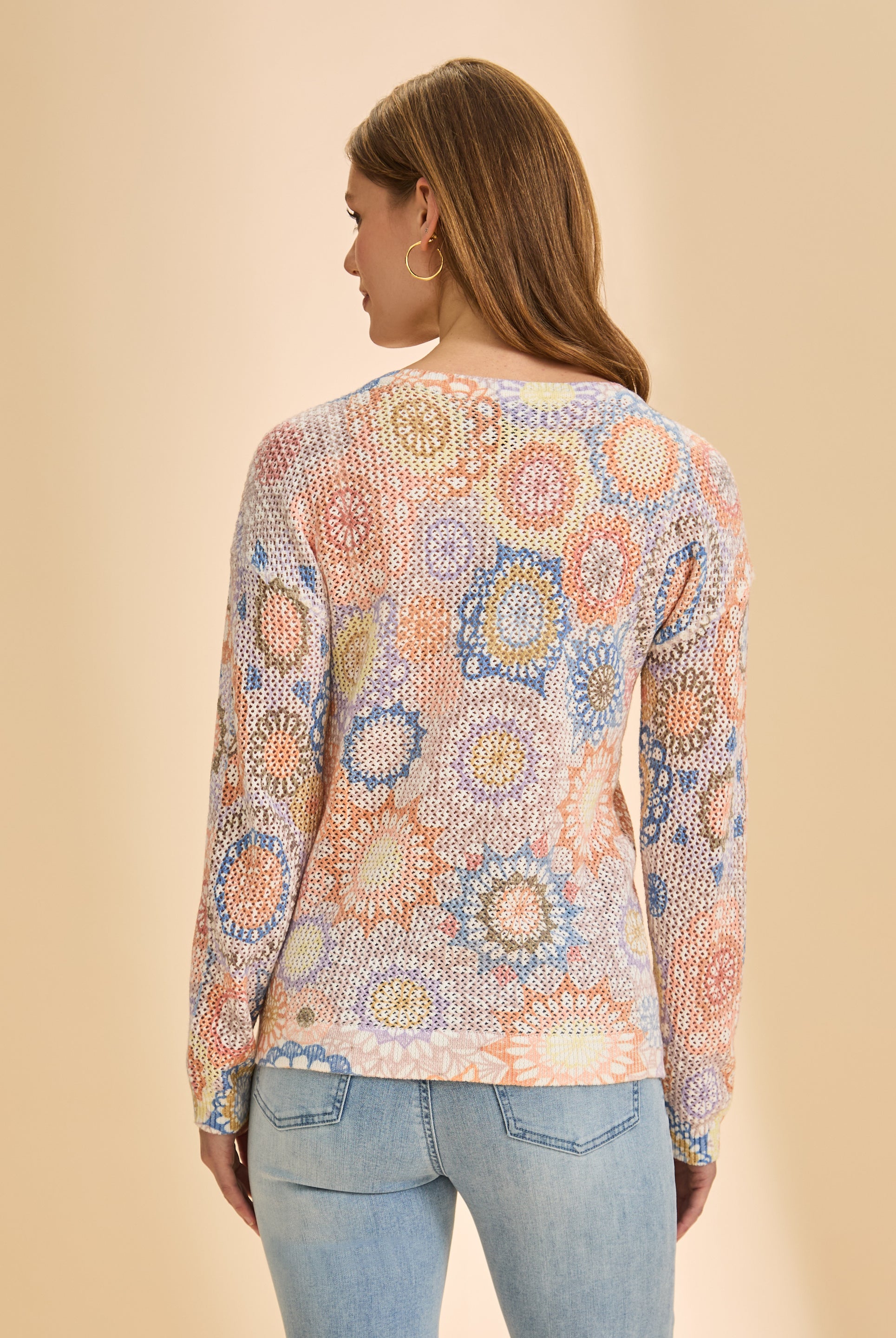 Back view of orange and blue mesh sweater displaying intricate pattern by French Dressing Jeans (FDJ)