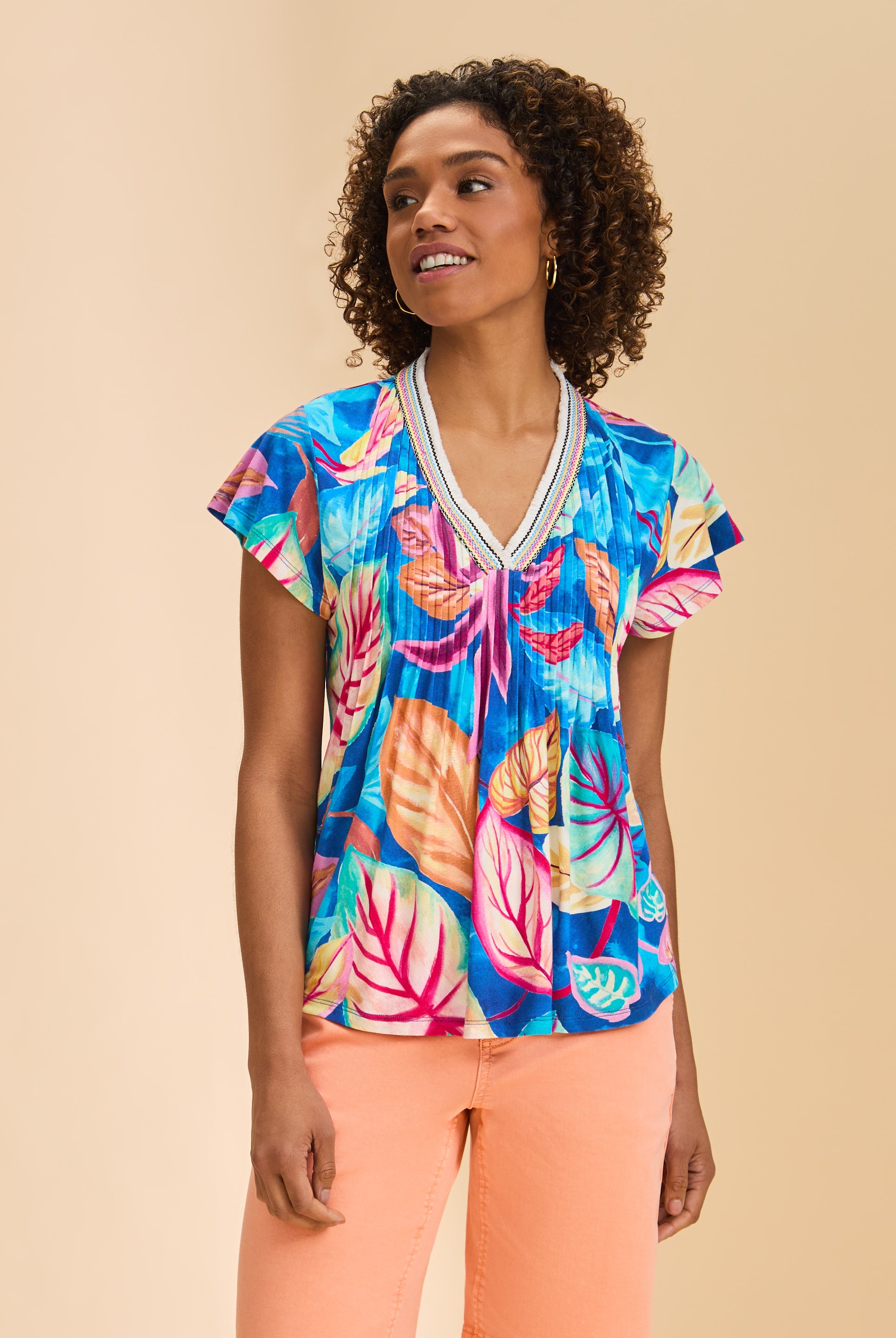Front view of floral Flutter Sleeve Pintuck Top with V-neck and pintucks by French Dressing Jeans (FDJ)