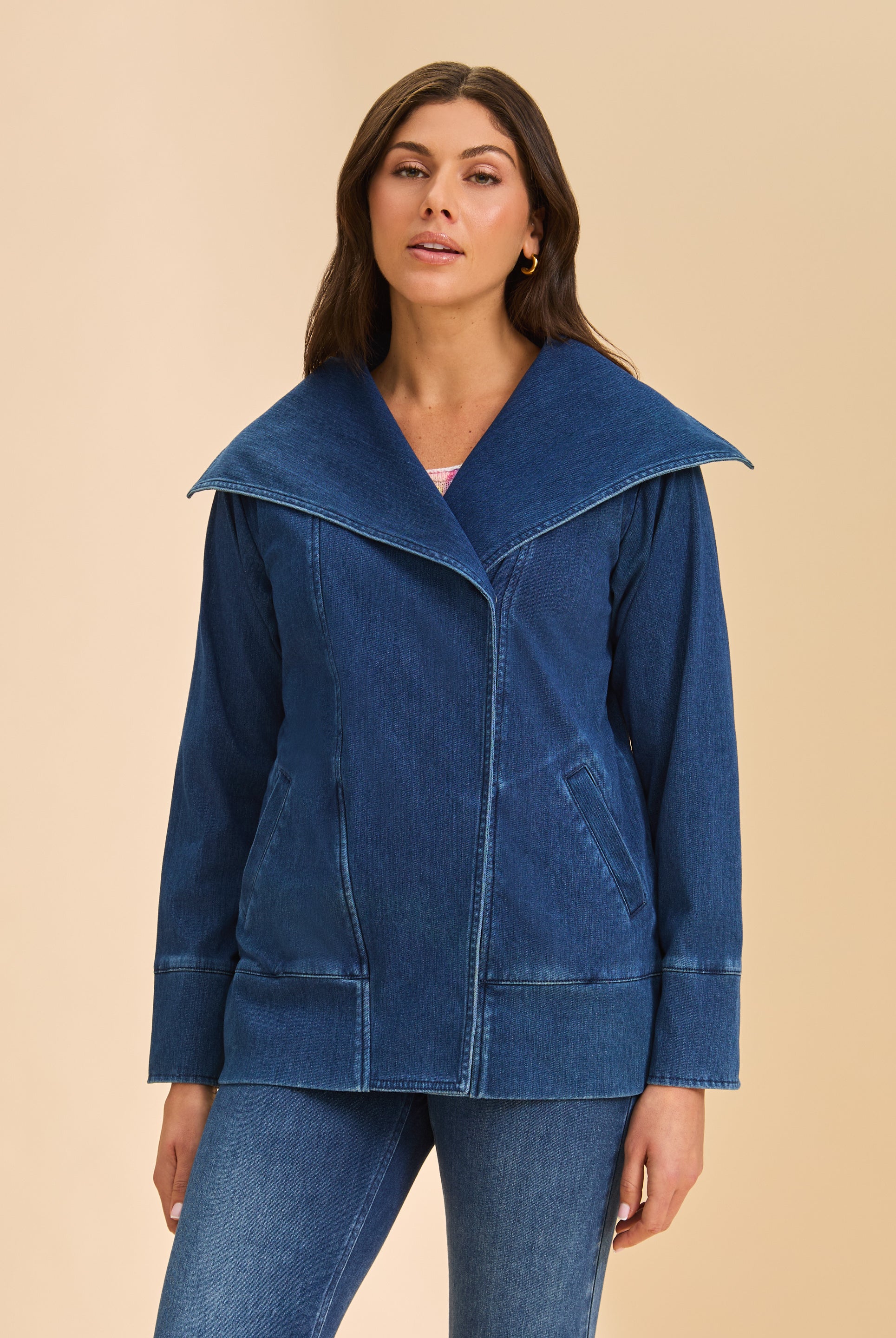 Front view of blue denim jacket with draped collar and welt pockets by French Dressing Jeans (FDJ)