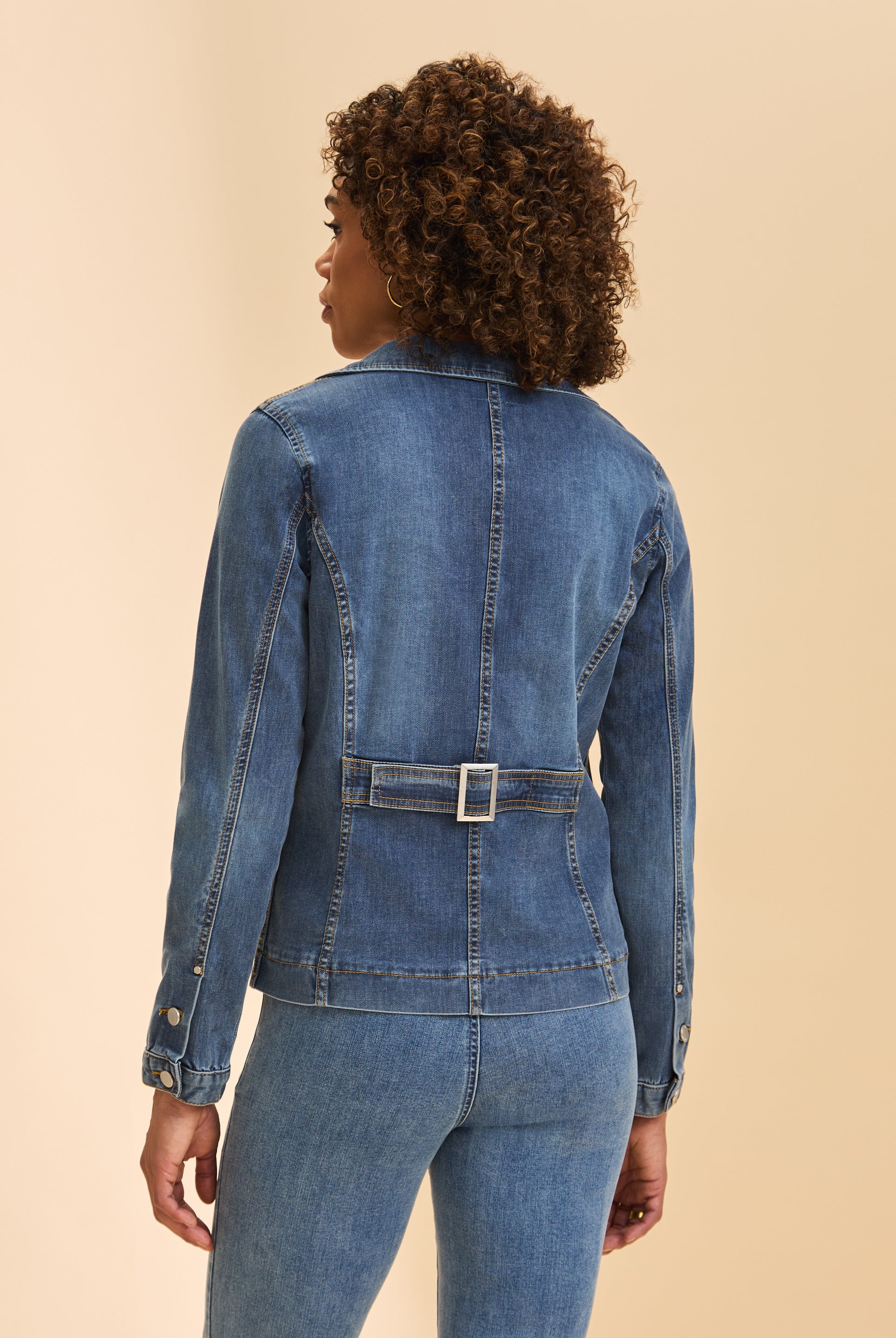Back view of denim blazer jacket highlighting belt detail and seam lines by French Dressing Jeans (FDJ)