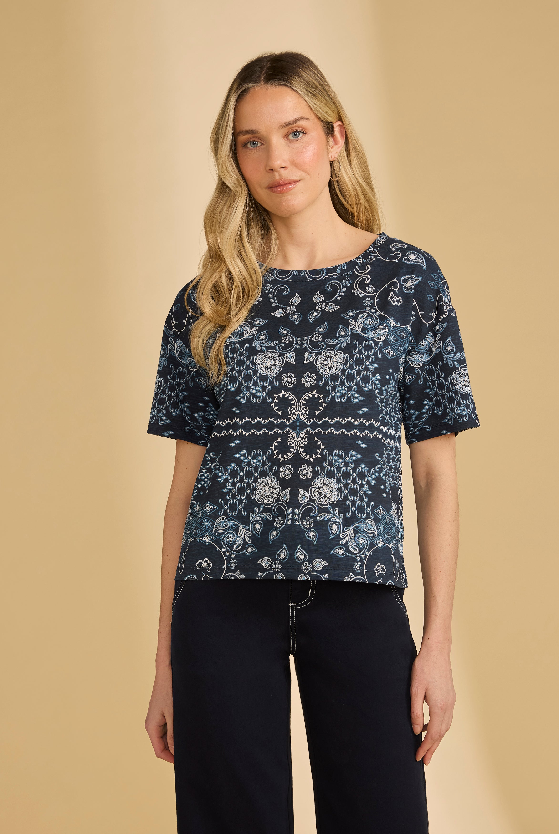 Front view of blue Polynesian block print top showing short sleeves and round neckline by French Dressing Jeans (FDJ)