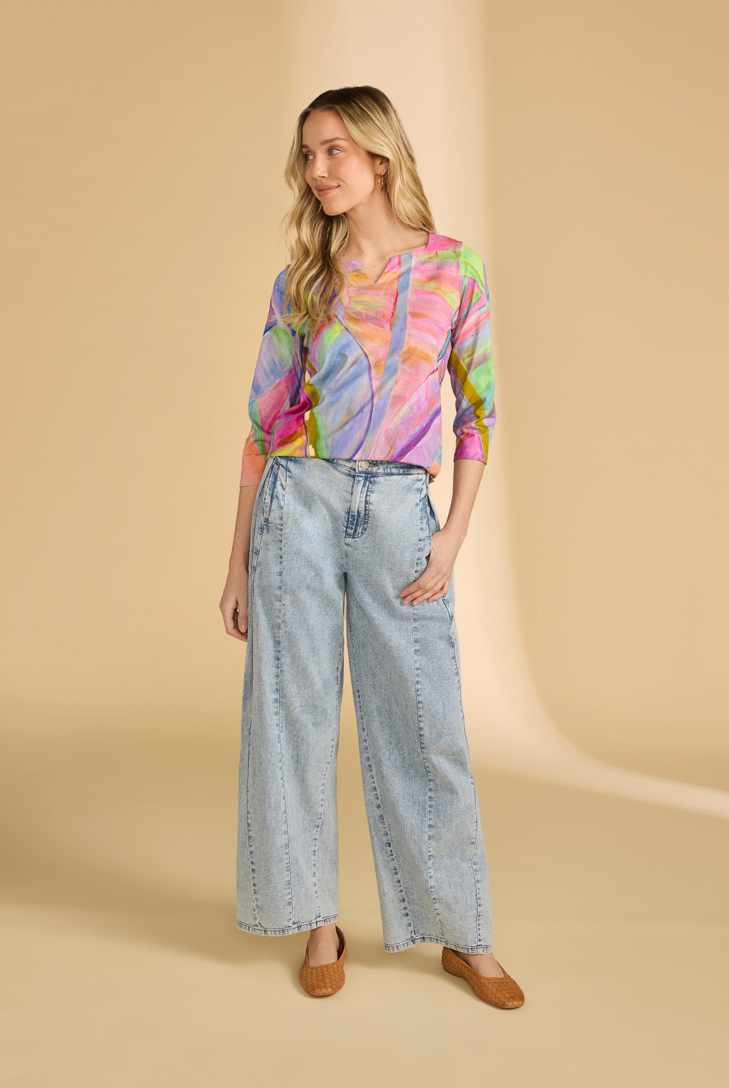 Full body view of neon palm top paired with wide-leg jeans, showcasing casual style by French Dressing Jeans (FDJ)