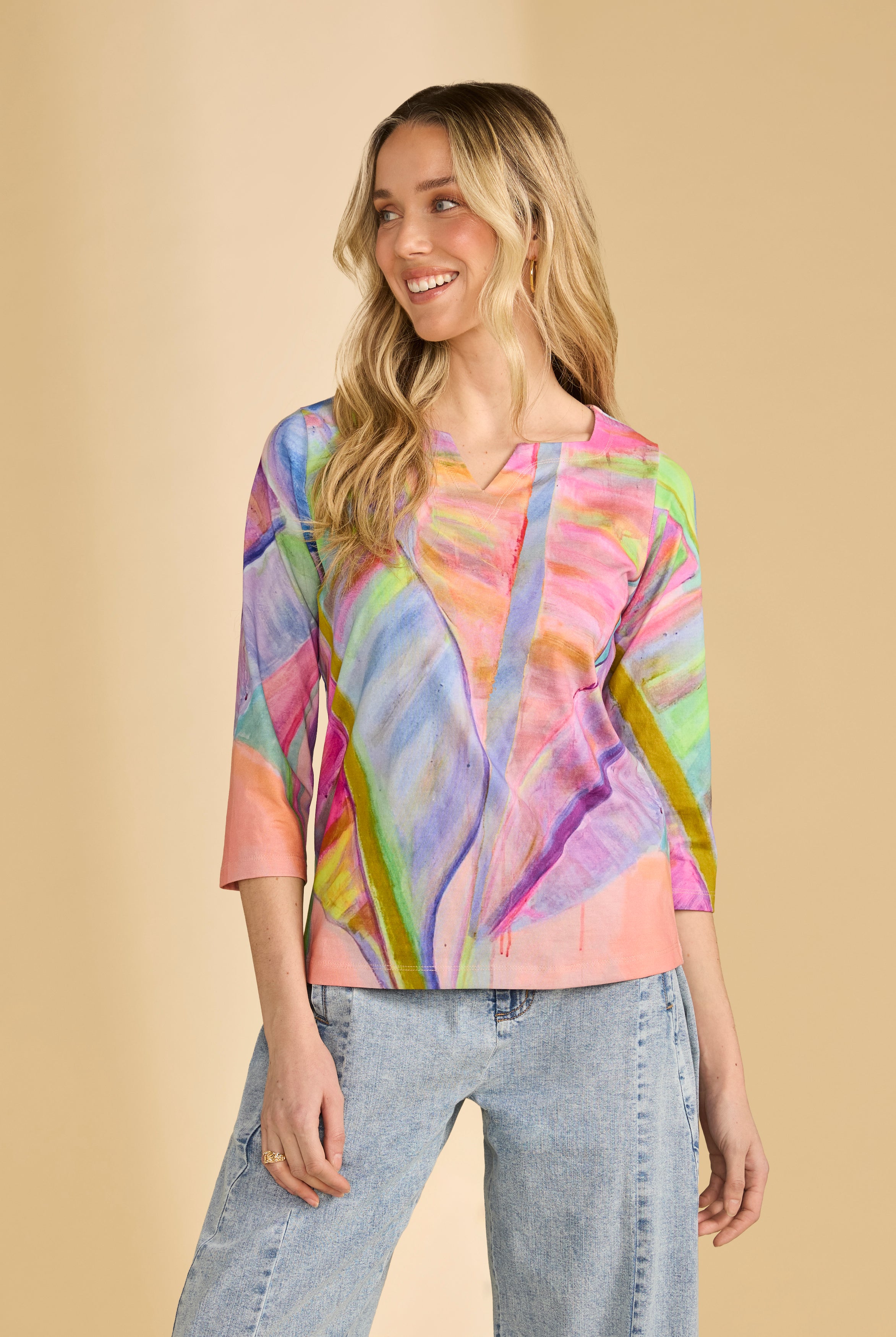 Front view of 3/4 sleeve notch neck top in neon palm with colorful abstract pattern by French Dressing Jeans (FDJ)