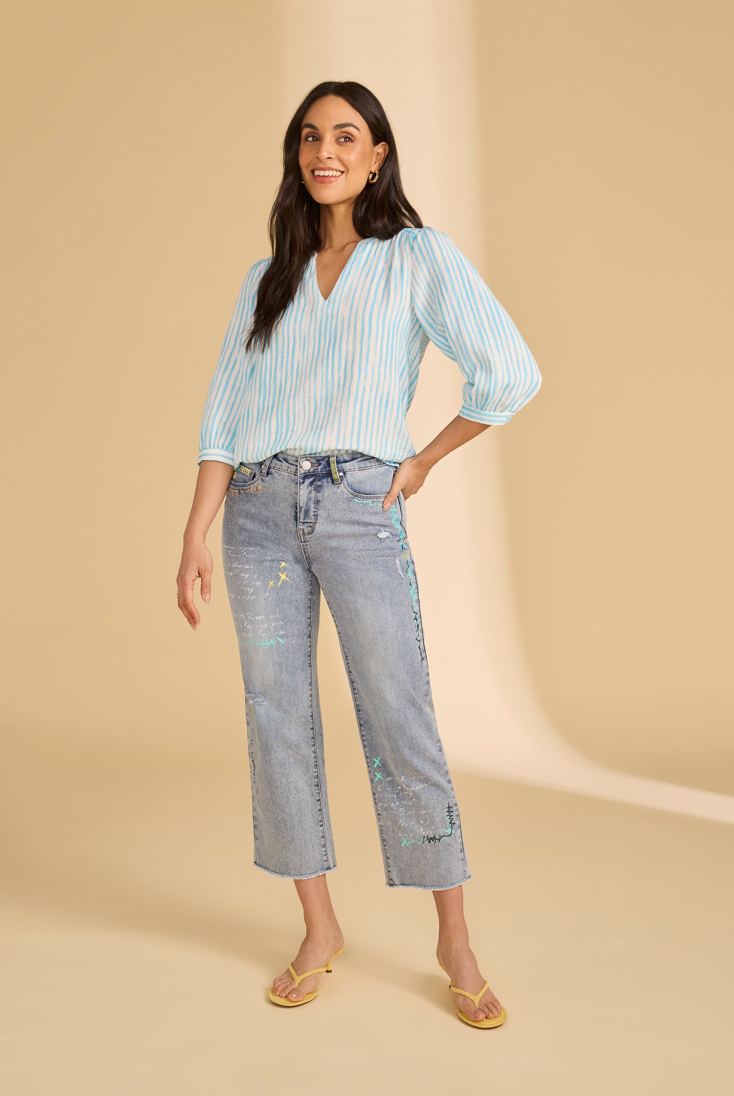 Full look of light blue striped blouse paired with jeans for a relaxed style by French Dressing Jeans (FDJ)