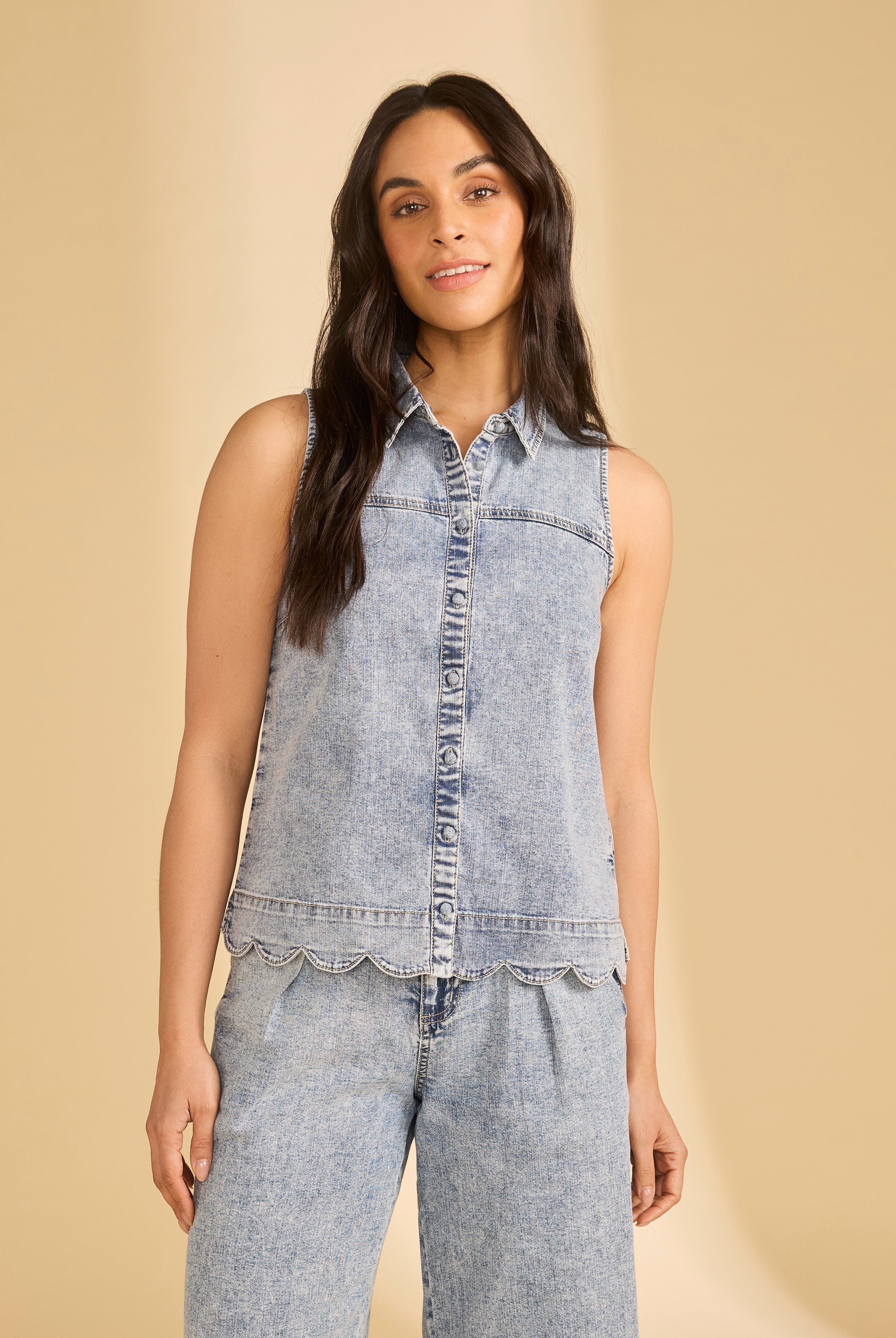 Close-up of sleeveless denim top in powder wash with button-down front by French Dressing Jeans (FDJ)