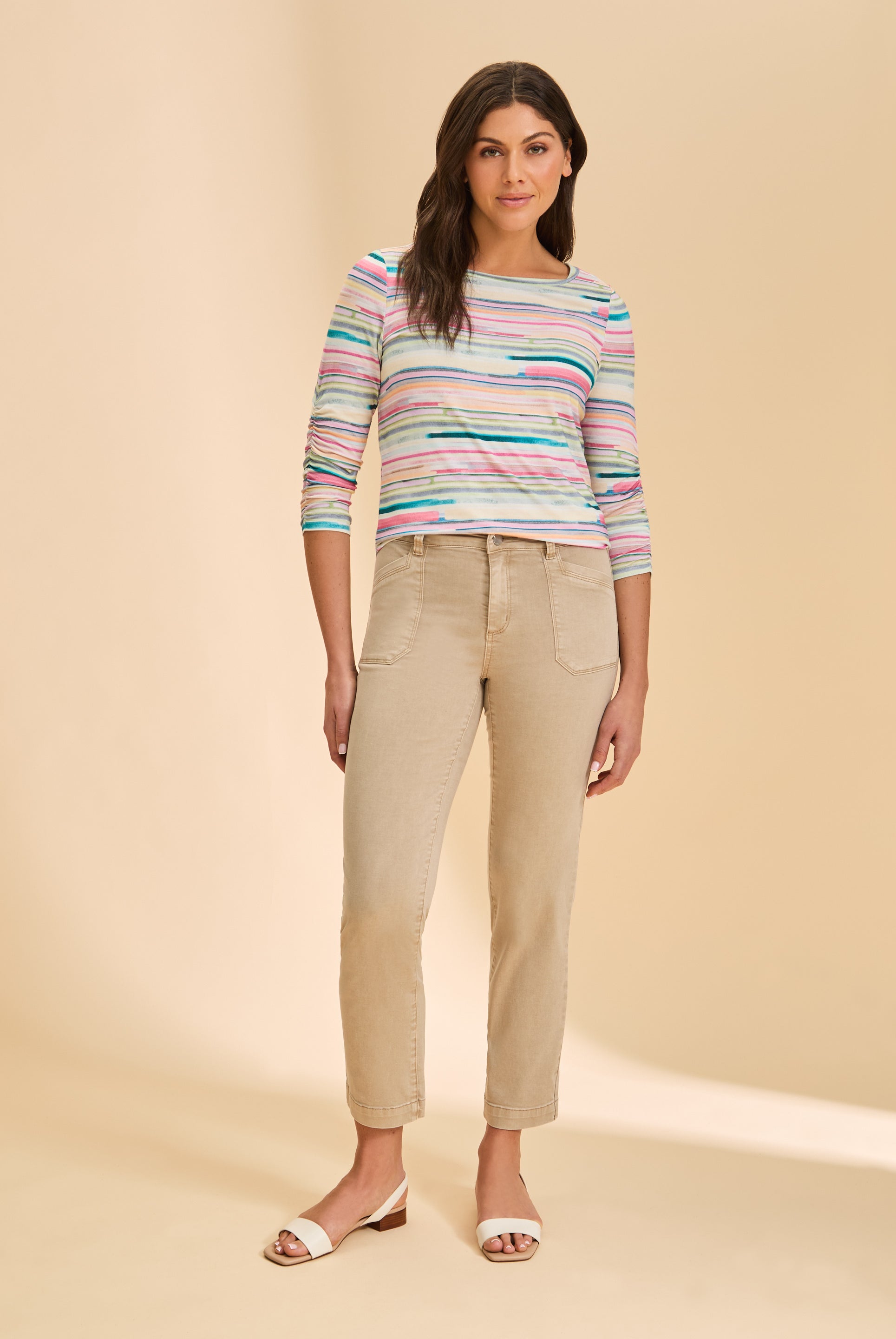 Full view of multicolored striped top styled with beige jeans by French Dressing Jeans (FDJ)
