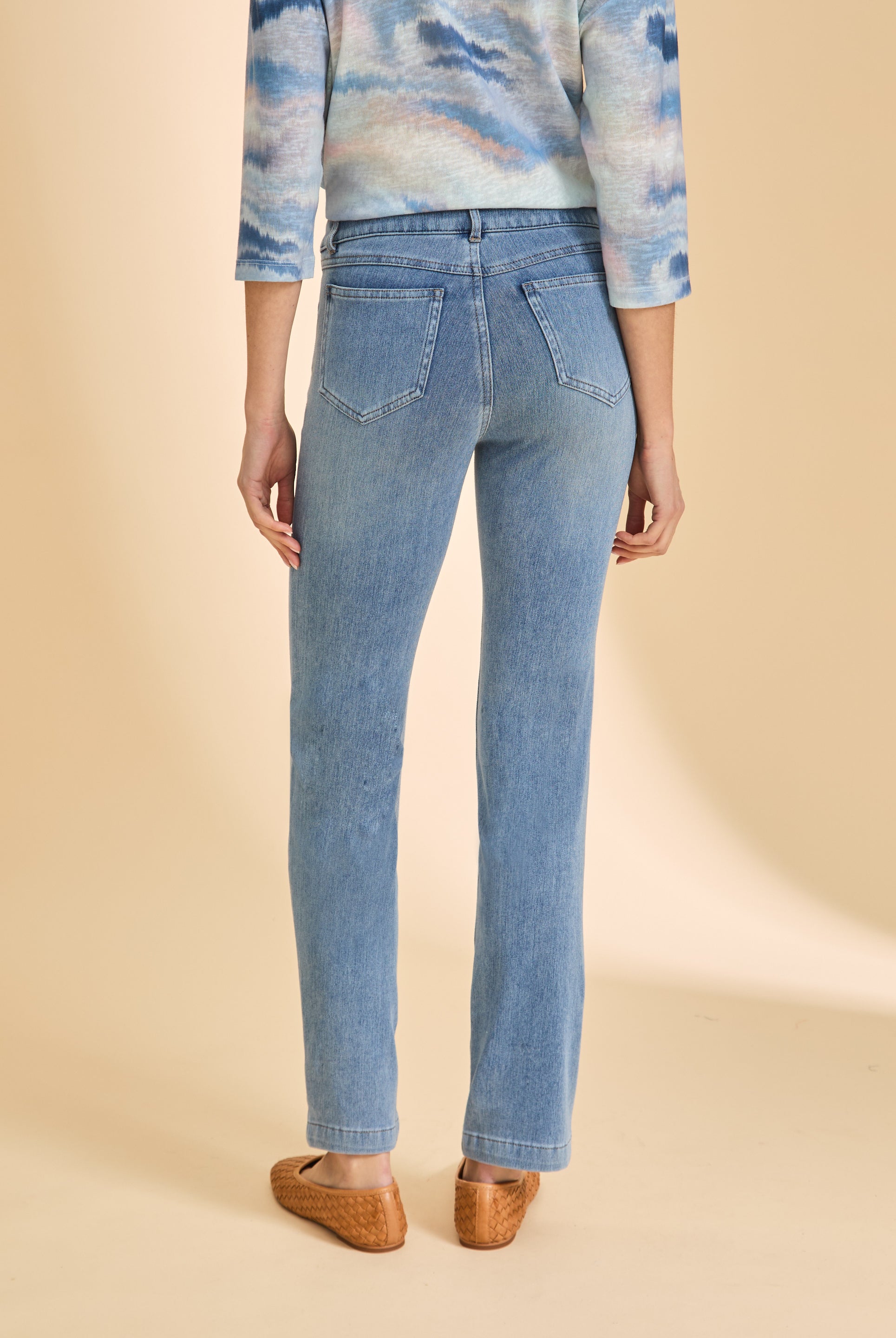 Back view of light blue jeans highlighting back pocket detail by French Dressing Jeans (FDJ)