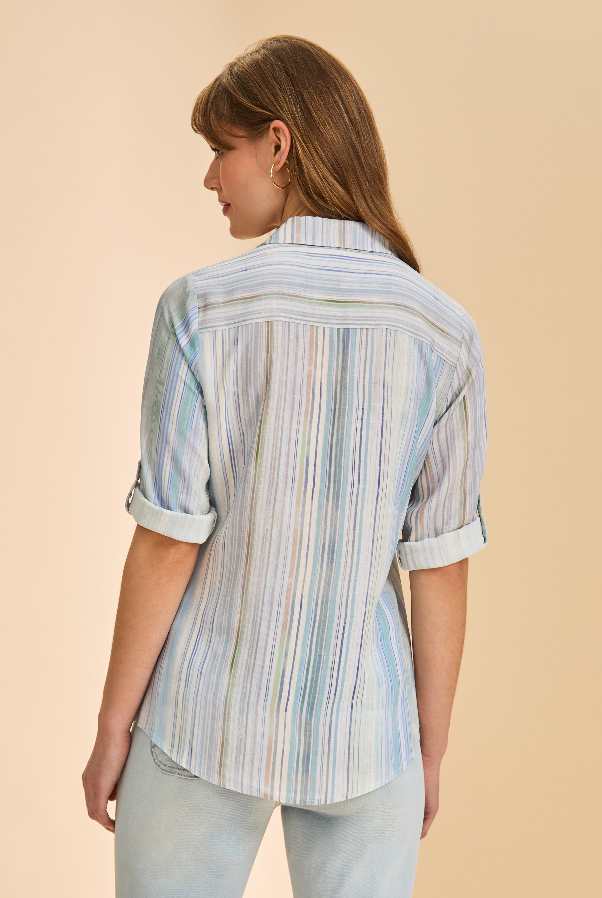 Back view of pastel striped shirt showcasing vertical stripes by French Dressing Jeans (FDJ)
