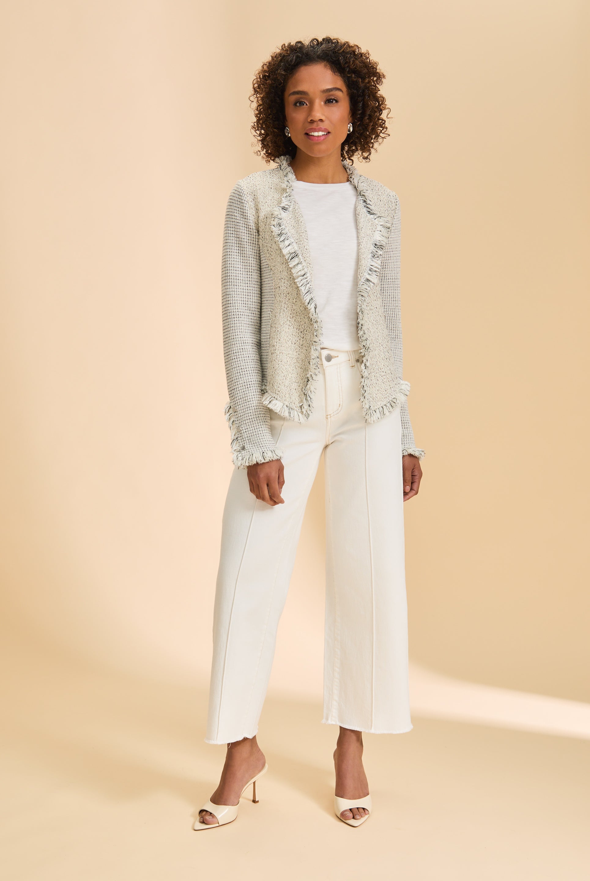 Full body view of cream tweed jacket styled with white pants and heels by French Dressing Jeans (FDJ)