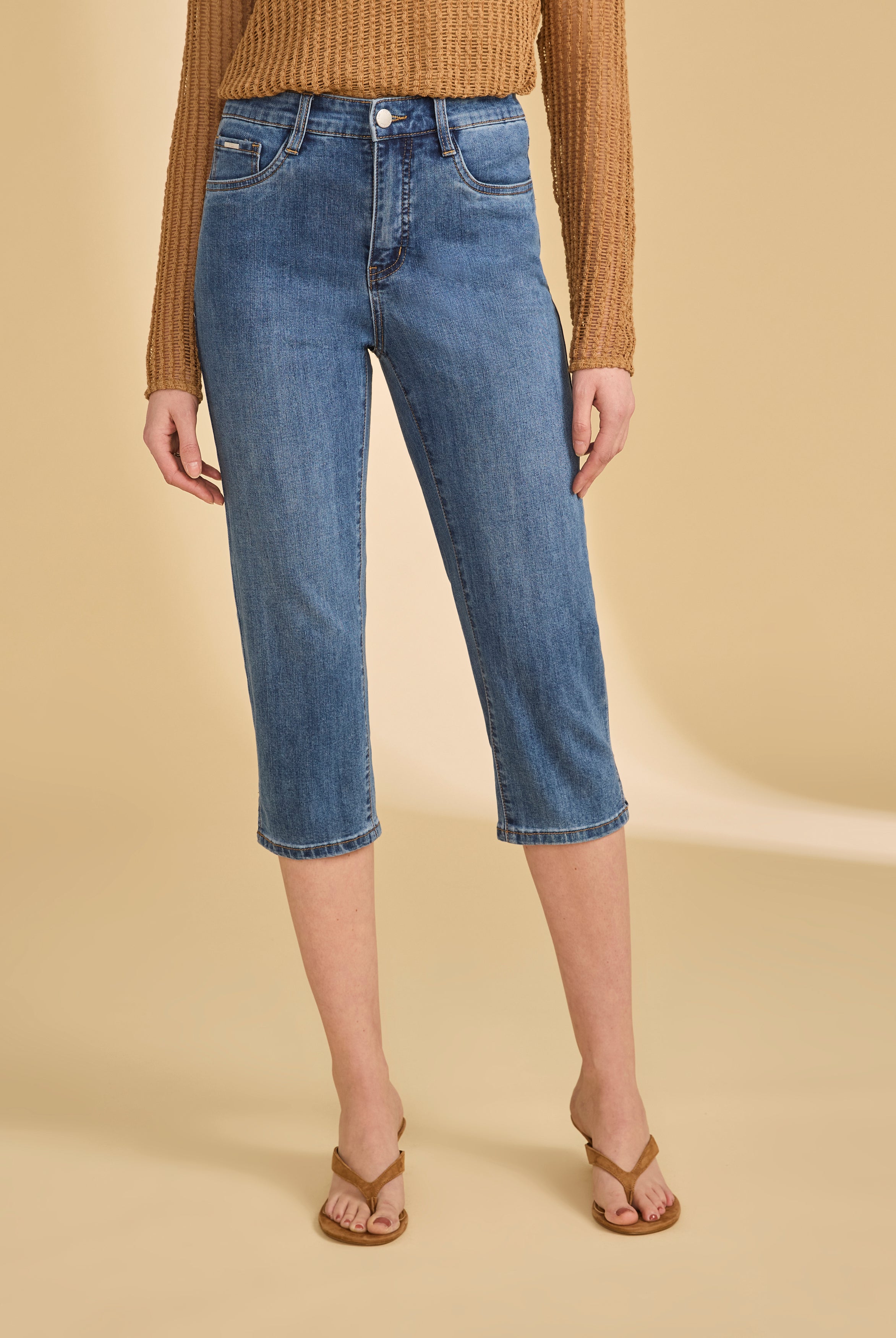 Front view of darker indigo blue cropped jeans with mid-rise fit by French Dressing Jeans (FDJ)