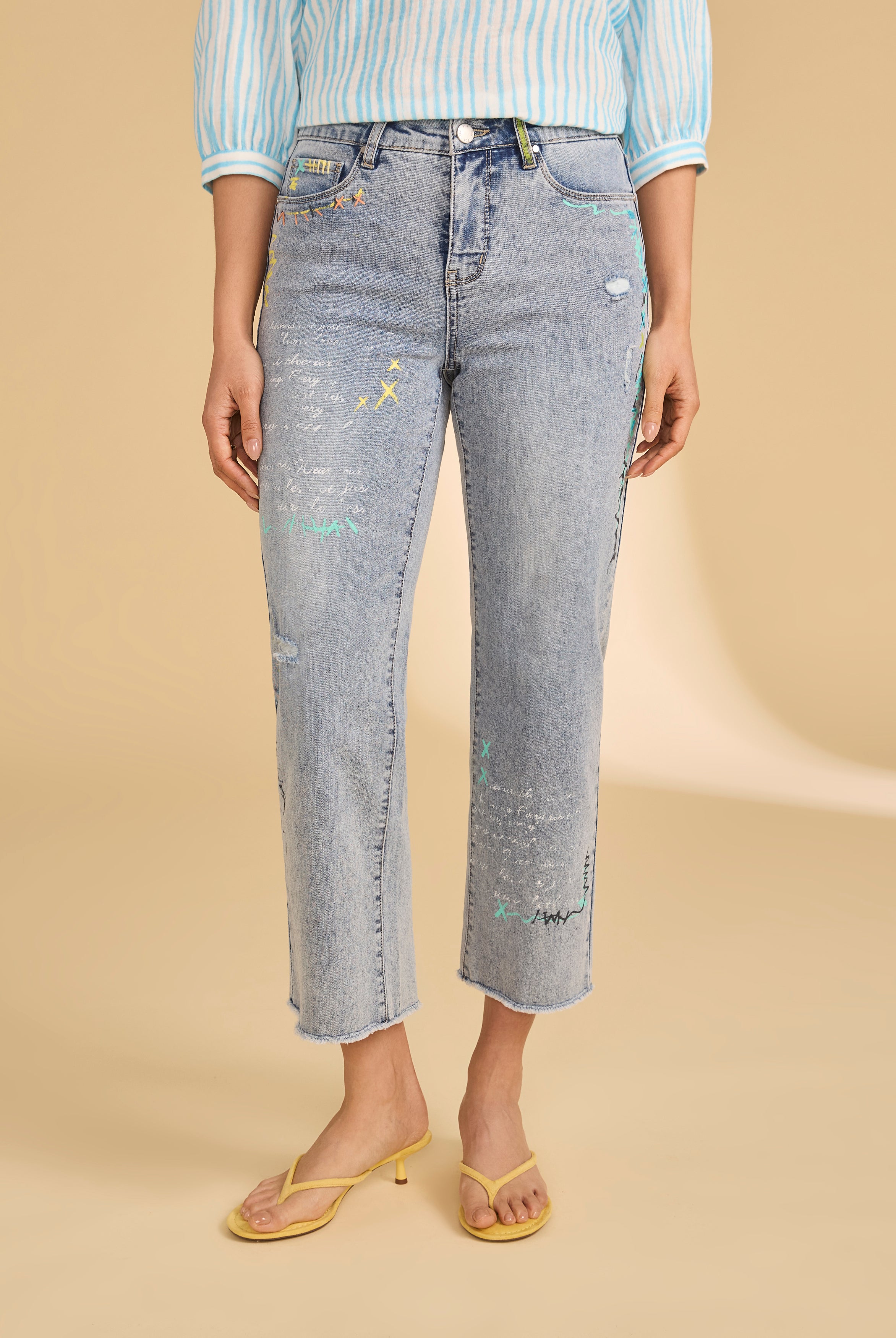 Front view of embroidered ocean denim jeans with colorful stitching by French Dressing Jeans (FDJ)