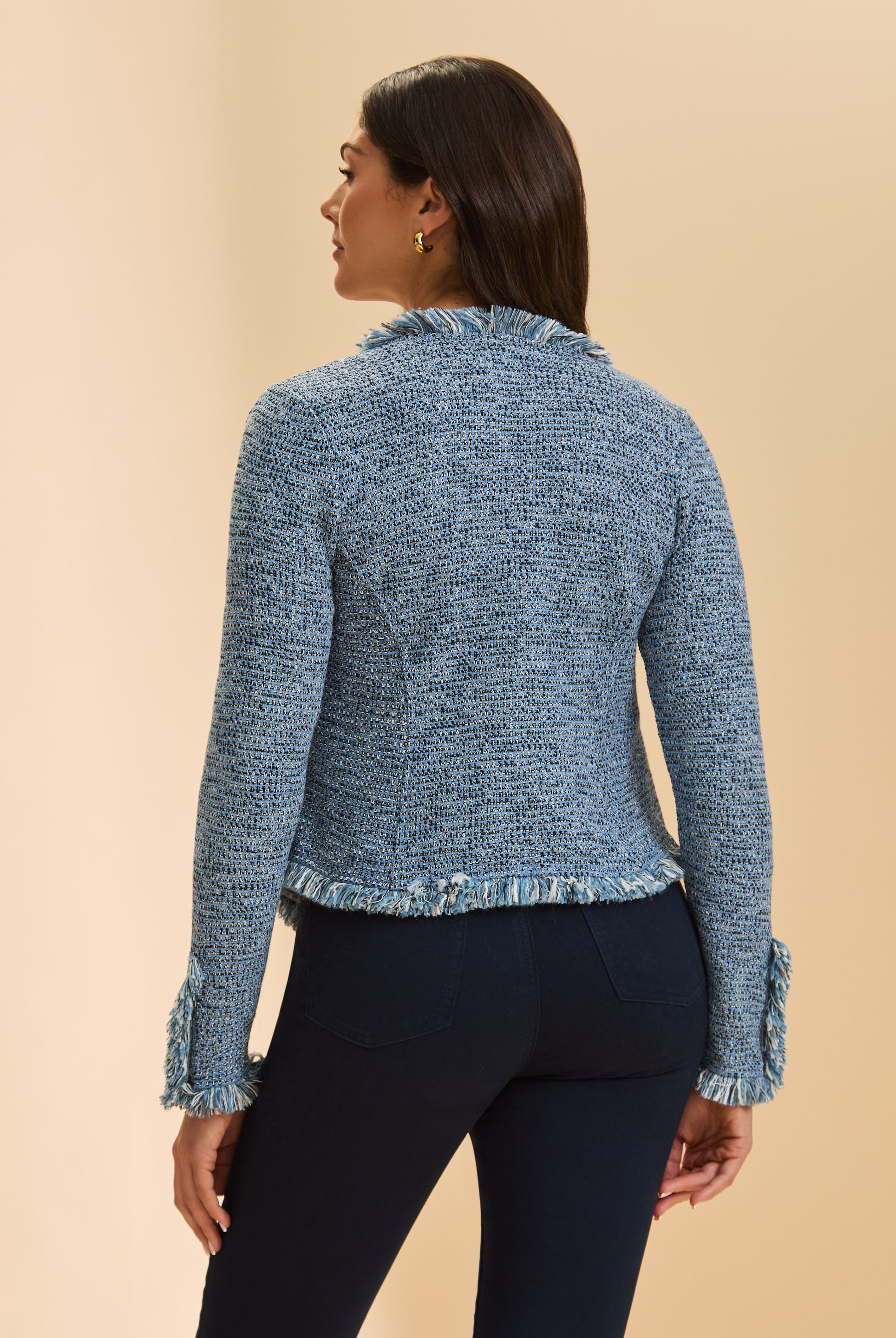 Back view of blue tweed jacket highlighting fringe details and tailored fit by French Dressing Jeans (FDJ)