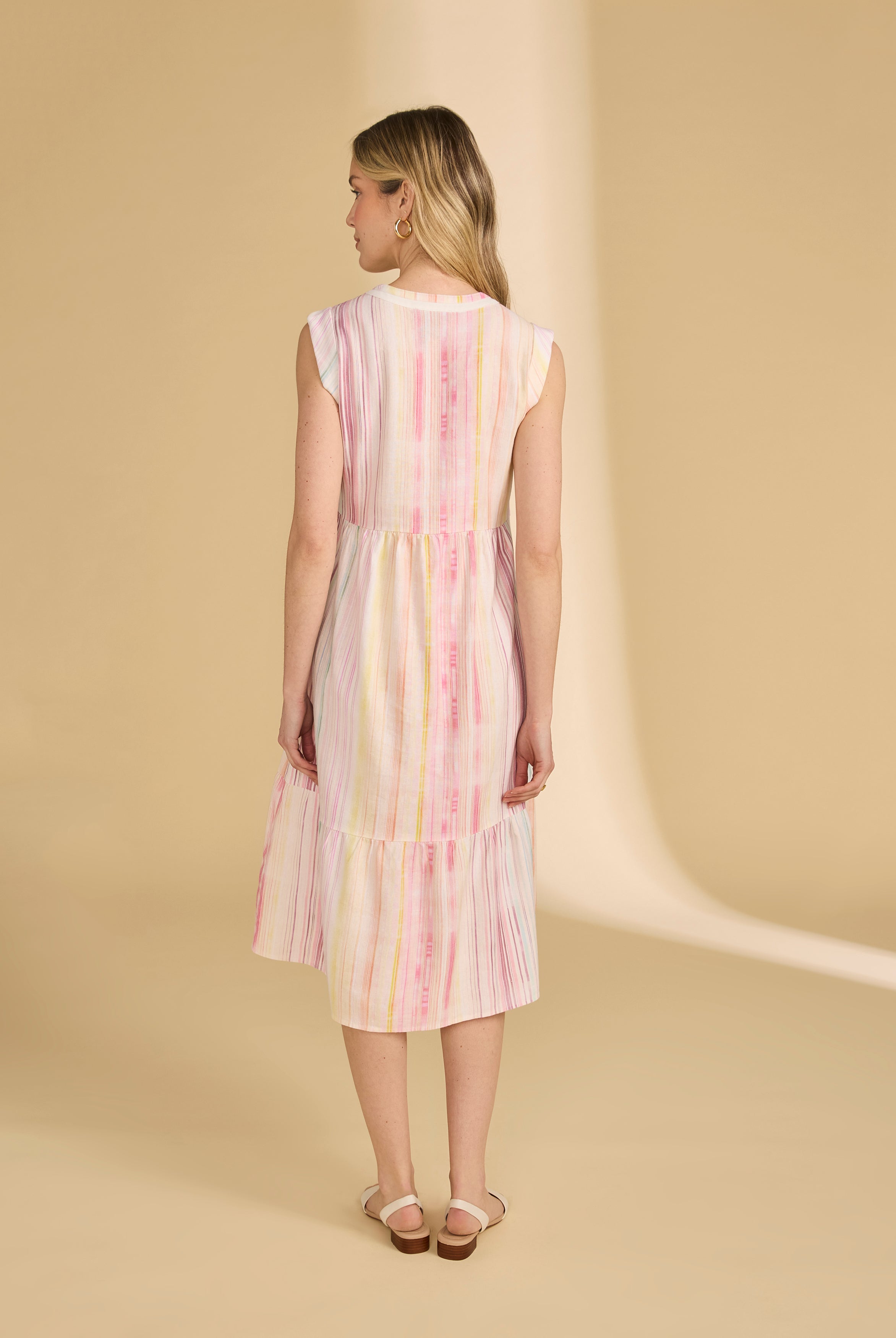 Back view of sleeveless striped dress with gathered waist and flowing skirt by French Dressing Jeans (FDJ)