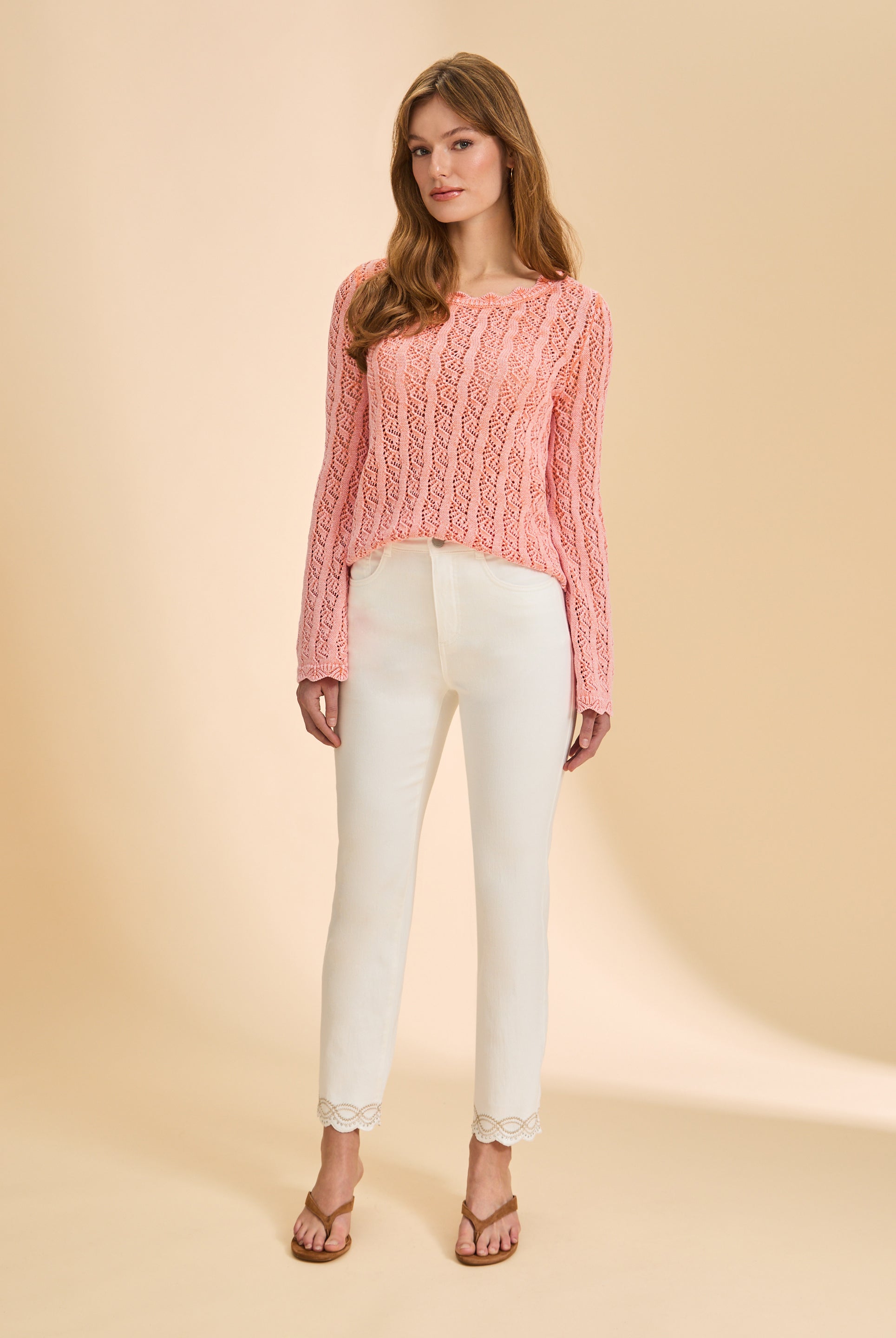 Full view of pink lace sweater paired with white pants by French Dressing Jeans (FDJ)