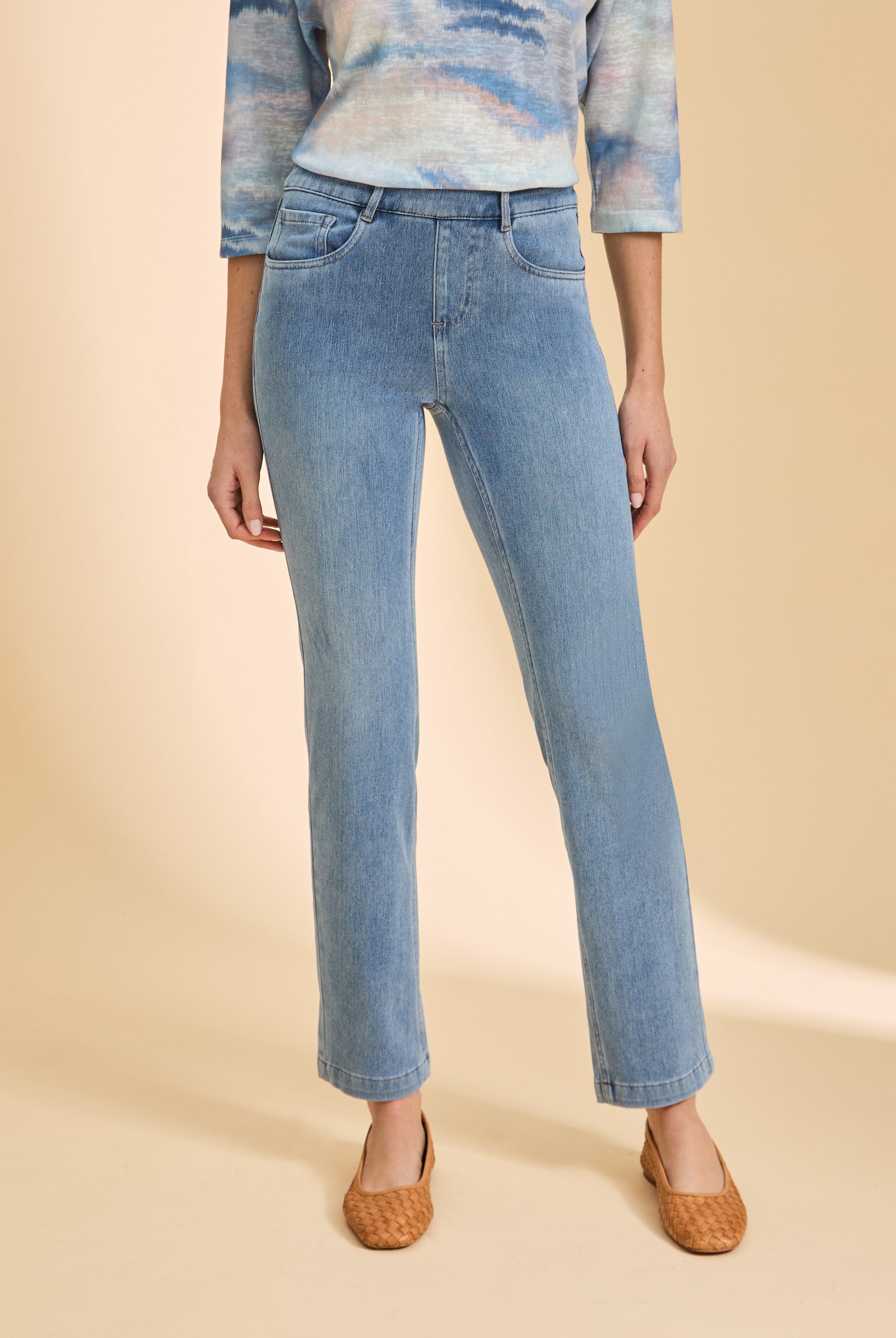 Close-up of light blue jeans showing front pocket and fit by French Dressing Jeans (FDJ)