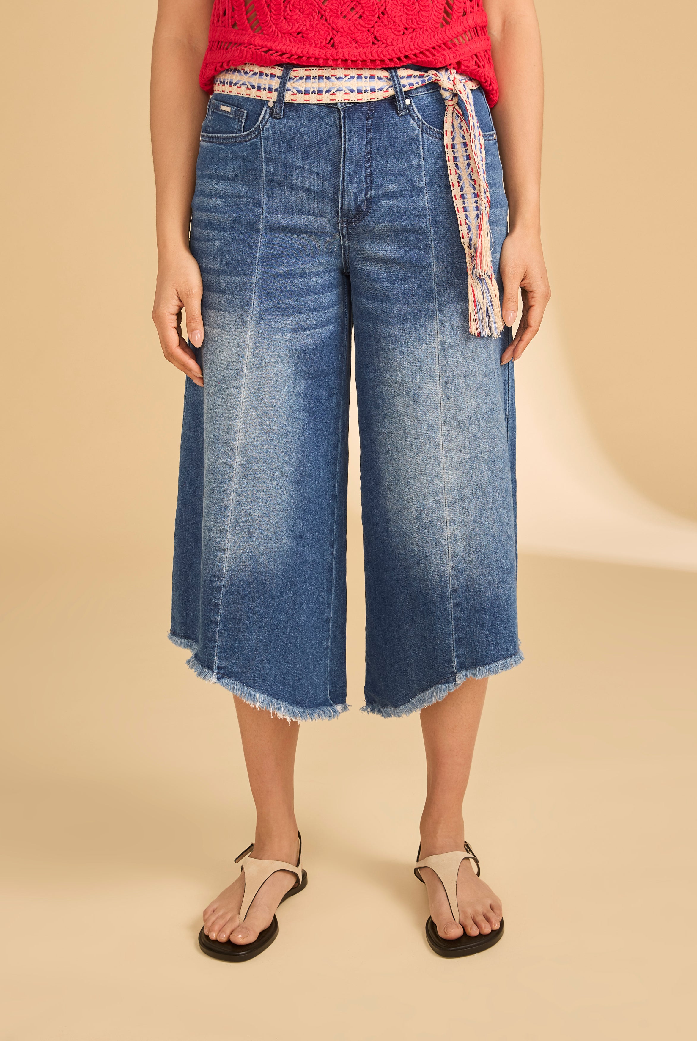 Front view of denim culottes with braided belt and crochet top by French Dressing Jeans (FDJ)