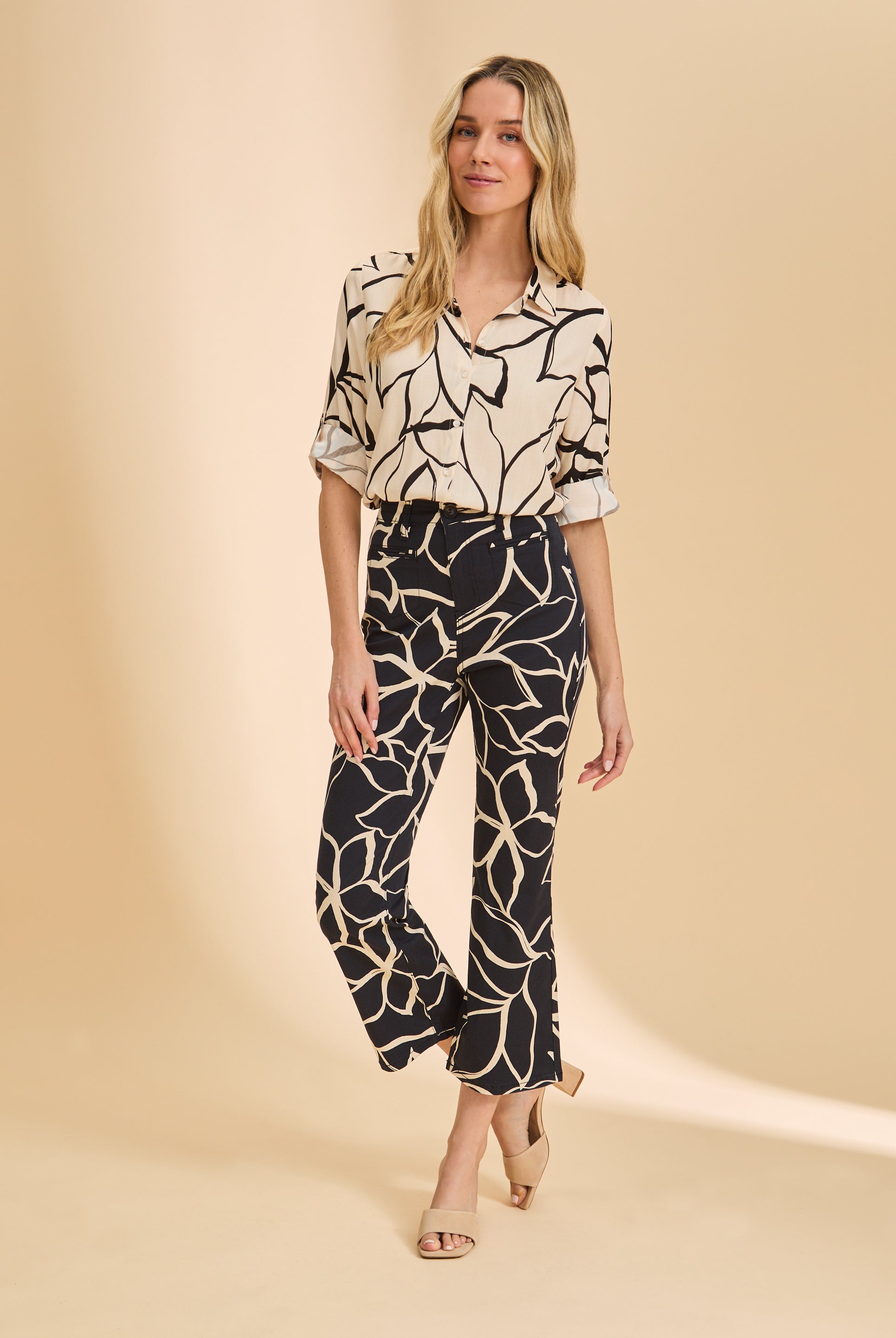 Front view of black plumeria boot crop pants with high-rise fit by French Dressing Jeans (FDJ)