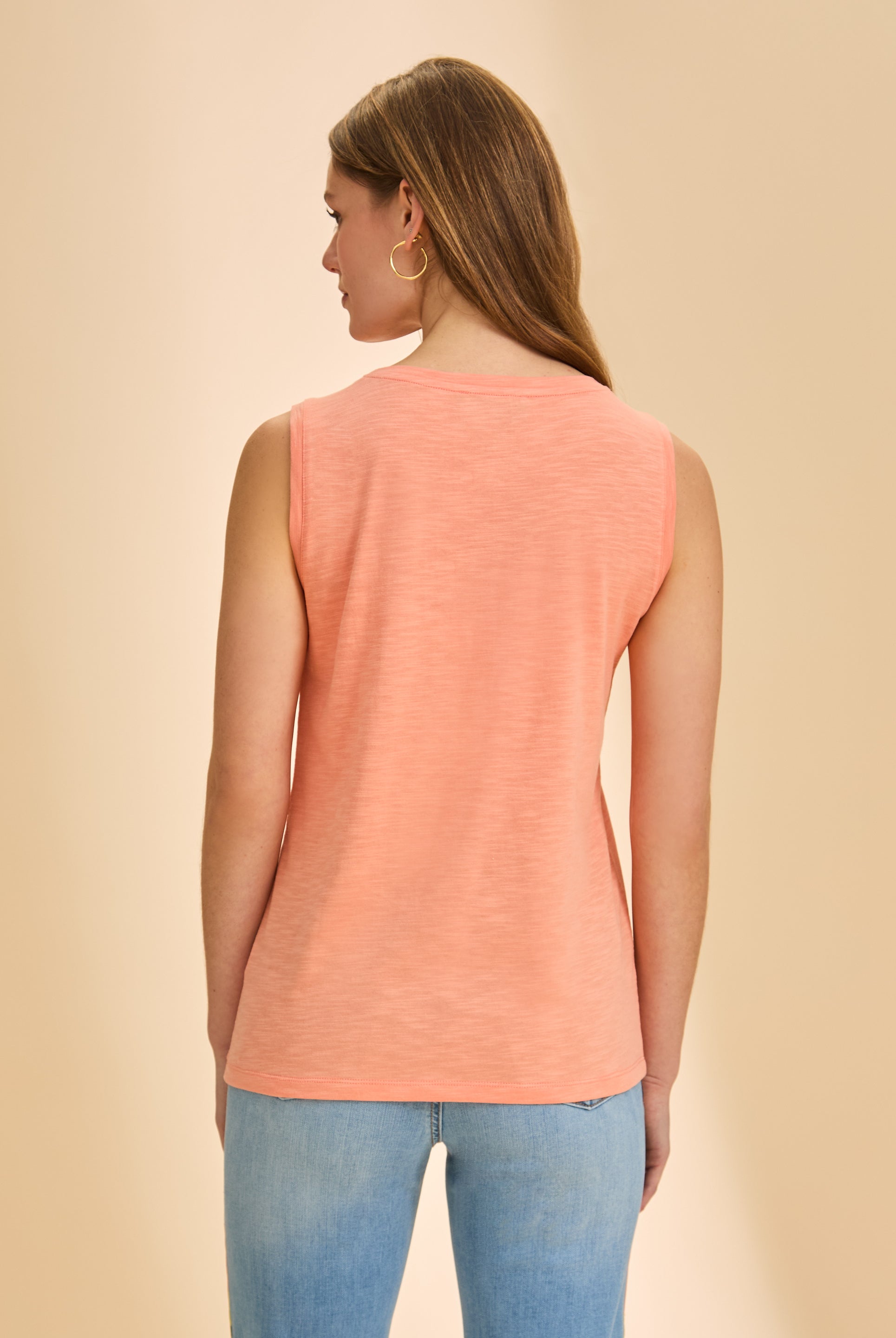 Back view of coral sleeveless top displaying simple design and lightweight fabric by French Dressing Jeans (FDJ)