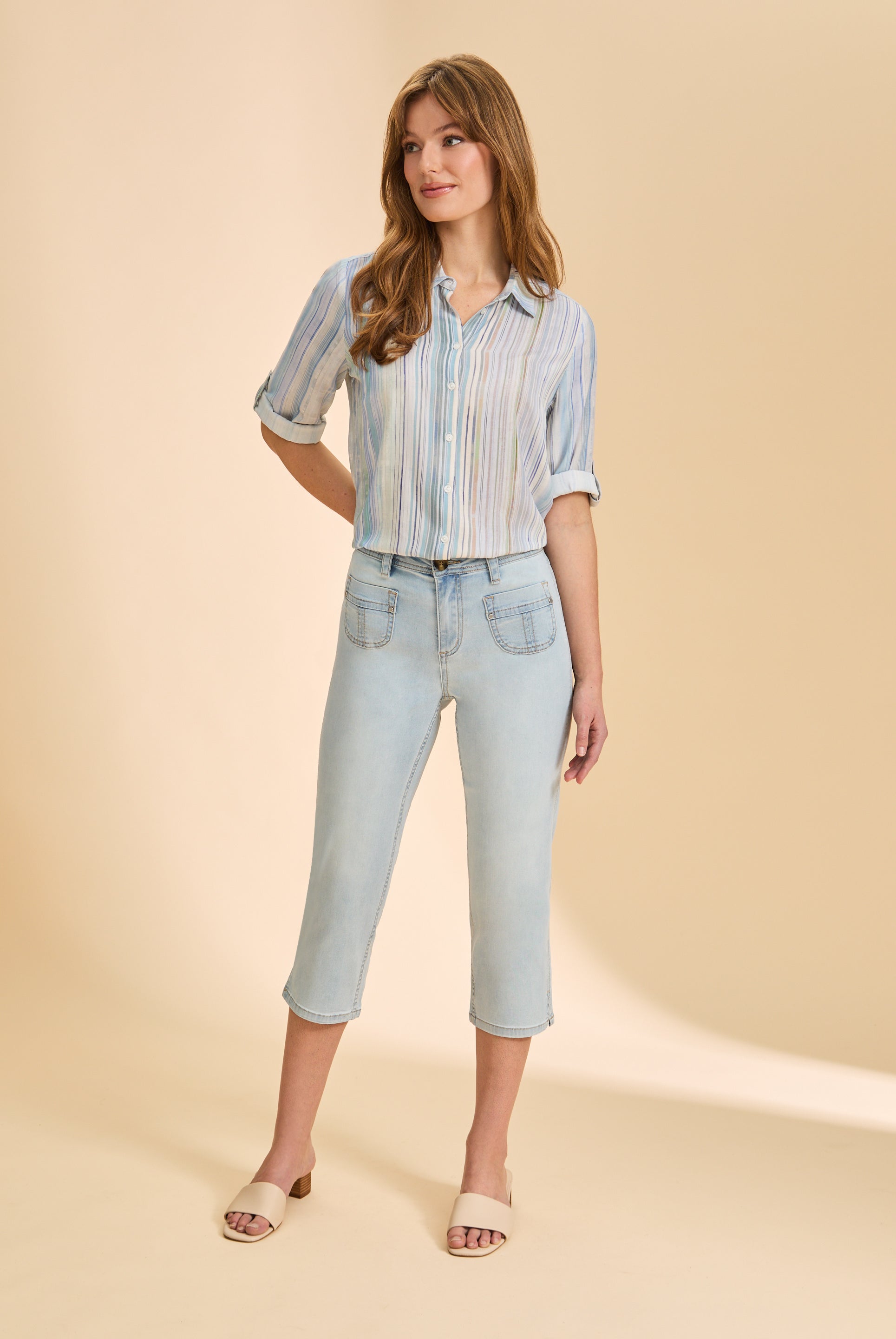 Full view of striped pastel shirt with rolled sleeves and light jeans by French Dressing Jeans (FDJ)