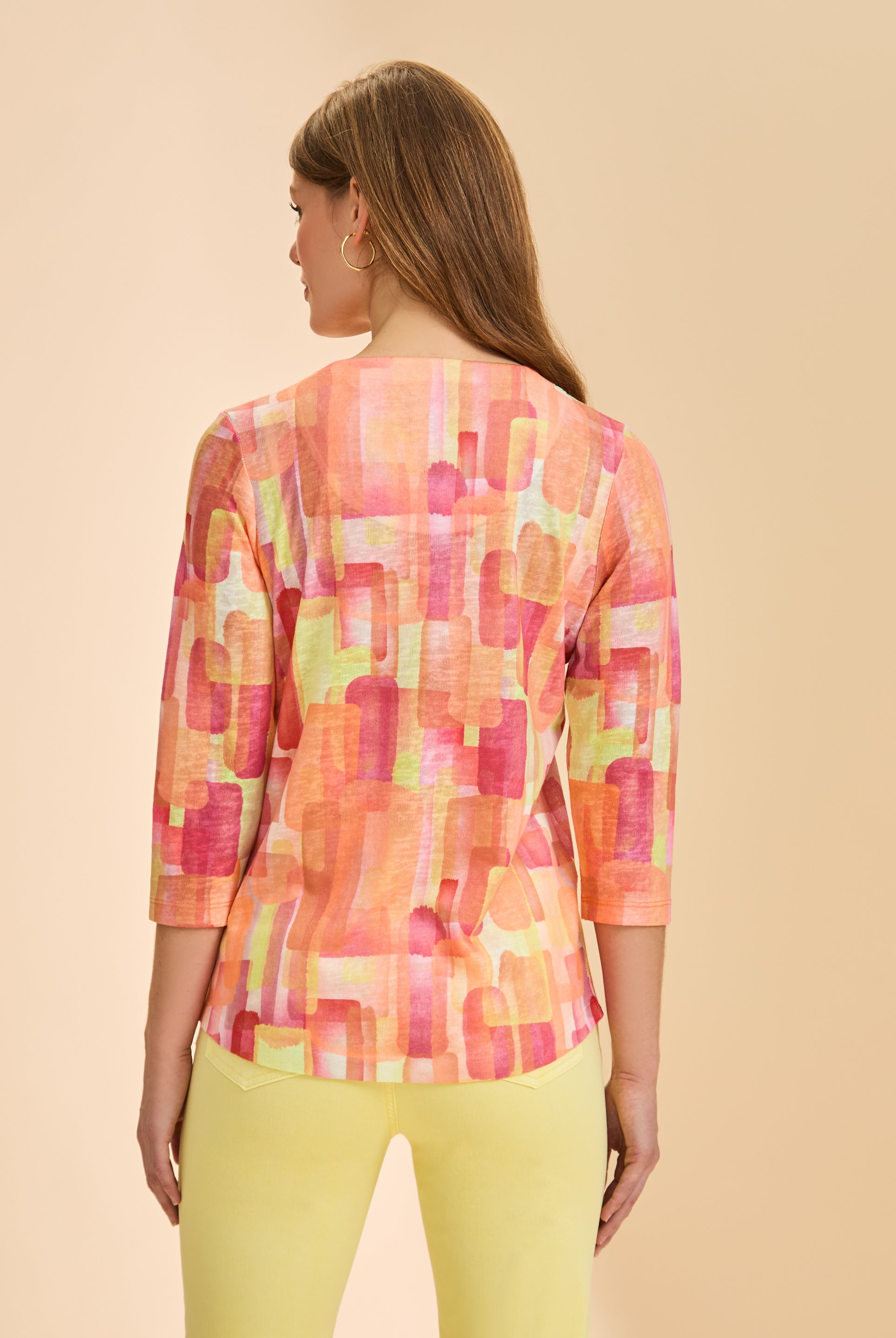 Back view of orange block print on 3/4 sleeve V-neck top by French Dressing Jeans (FDJ)