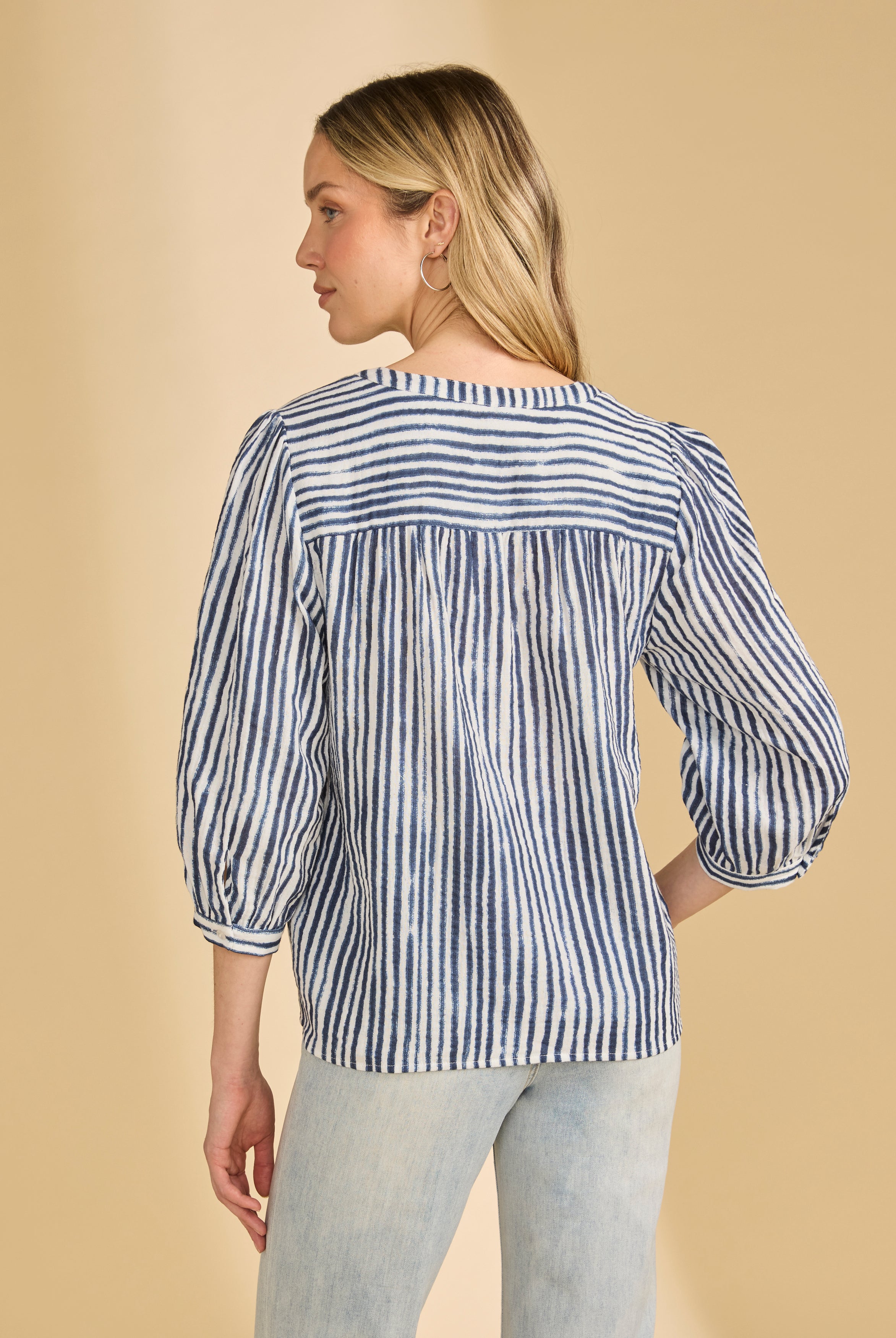 Back view of navy striped blouse with gathered yoke and 3/4 sleeves by French Dressing Jeans (FDJ)