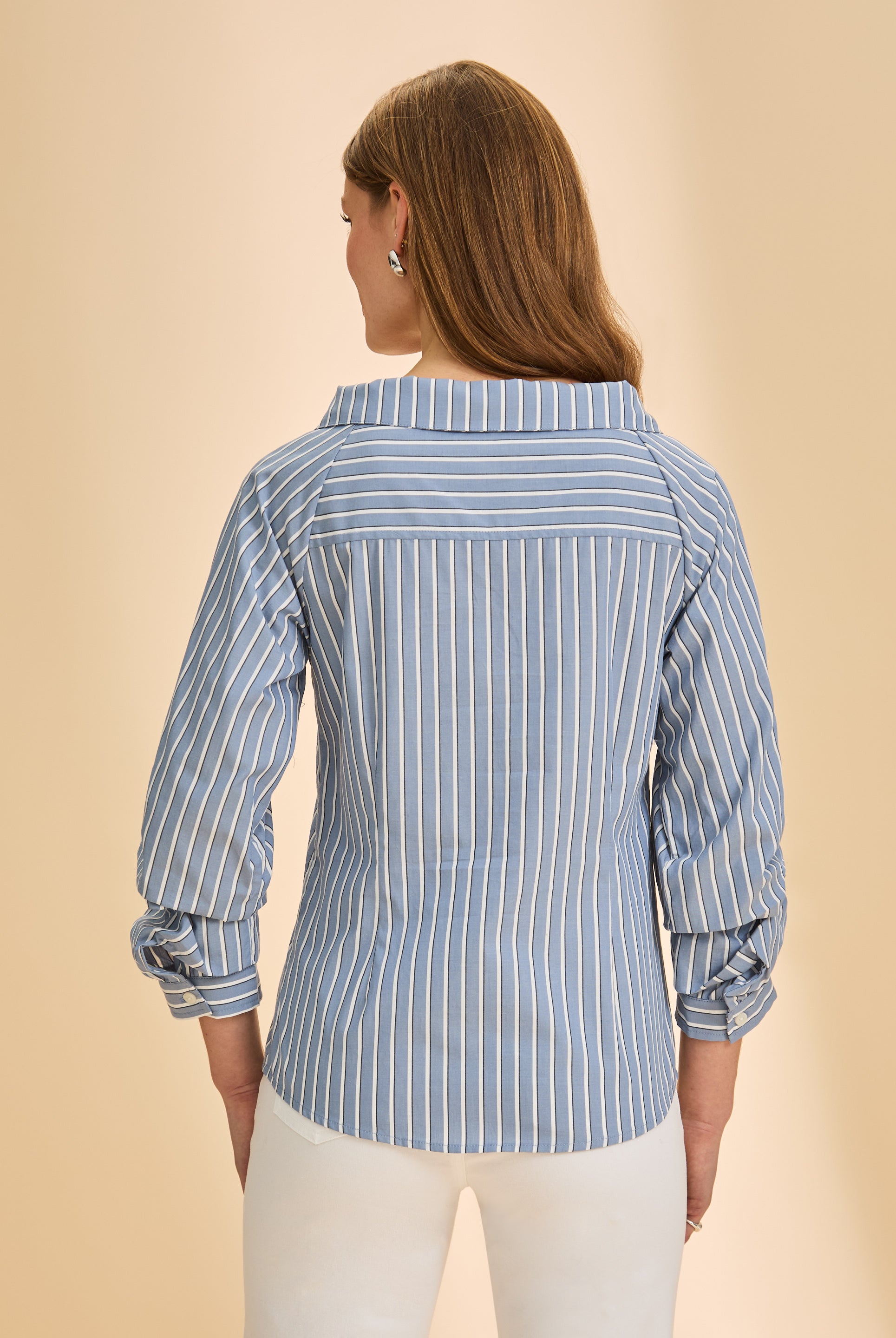 Back view of blue striped shirt displaying collar and cuff detail by French Dressing Jeans (FDJ)