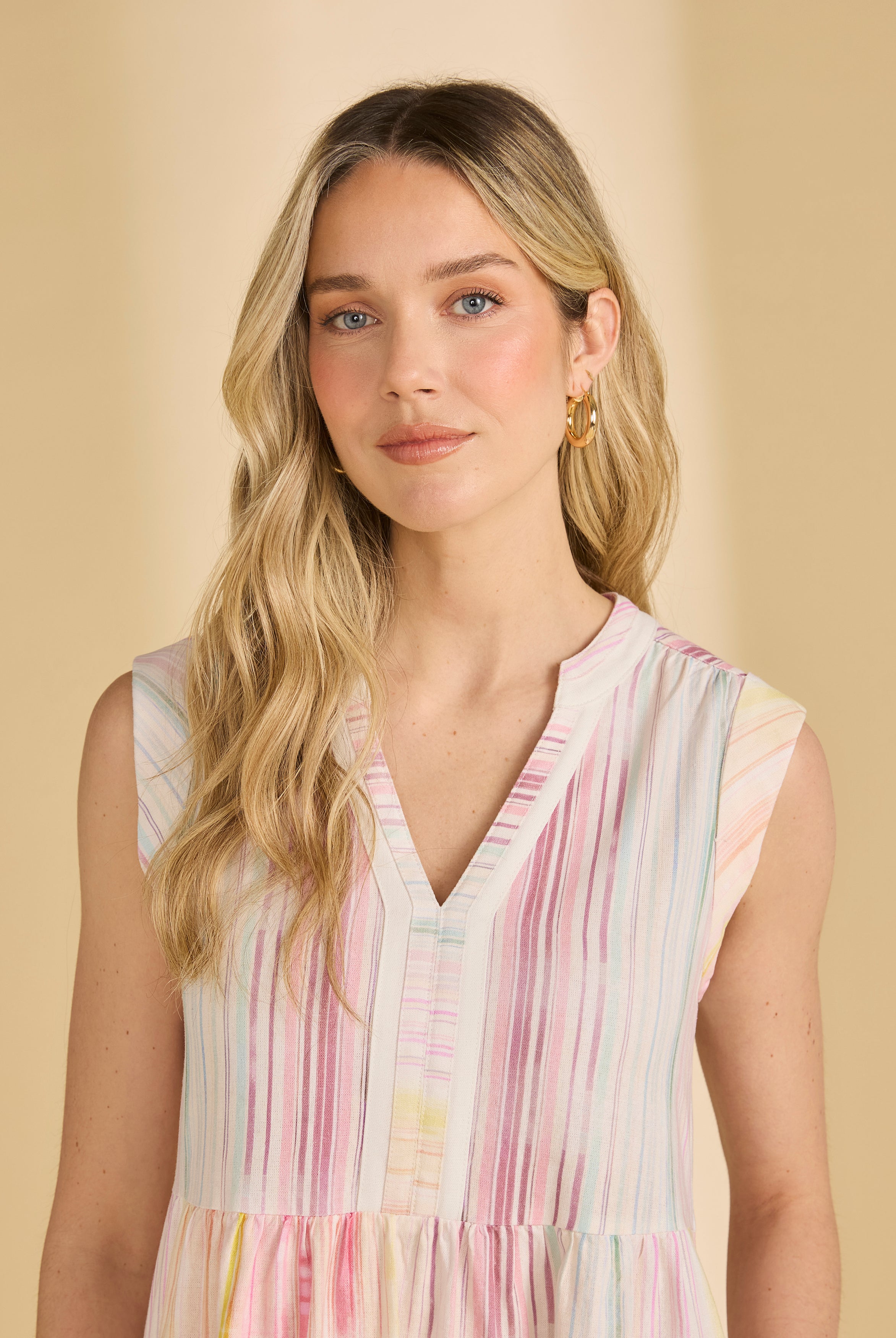Close-up of sleeveless striped dress highlighting V-neck and soft fabric by French Dressing Jeans (FDJ)